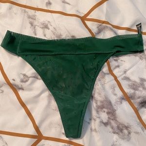 BootayBag green mesh thong with stars detail size M